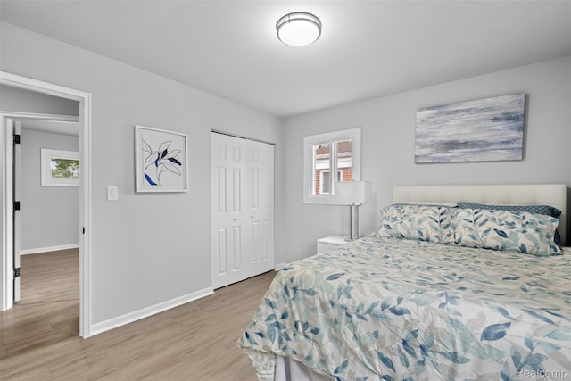 30112 Matthew St, Westland, MI 48186 - bedroom with wood finished floors, baseboards, and a closet