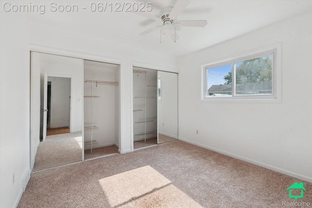 32703 Anita Dr, Westland, MI 48185 - unfurnished bedroom with two closets, carpet floors, and a ceiling fan