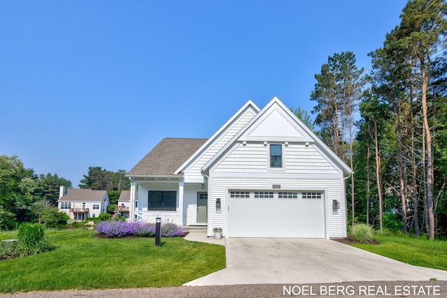 18153 Newgate Ln, Spring Lake, MI 49456 - view of front of home with a front yard and concrete driveway