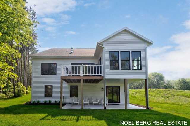 18153 Newgate Ln, Spring Lake, MI 49456 - rear view of house featuring a patio area, a yard, and a deck
