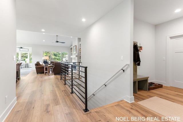 18153 Newgate Ln, Spring Lake, MI 49456 - corridor featuring an upstairs landing, light wood-style flooring, recessed lighting, and baseboards