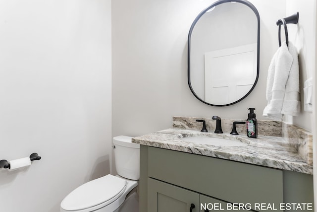 18153 Newgate Ln, Spring Lake, MI 49456 - half bathroom with vanity and toilet