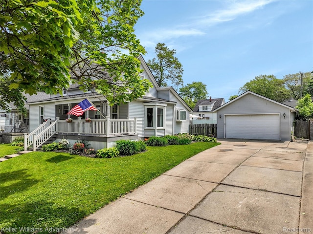 2931 4th St, Trenton, MI 48183 - view of front of property featuring a wooden deck and a detached garage