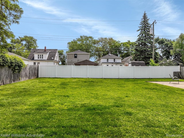 2931 4th St, Trenton, MI 48183 - fenced backyard with a patio