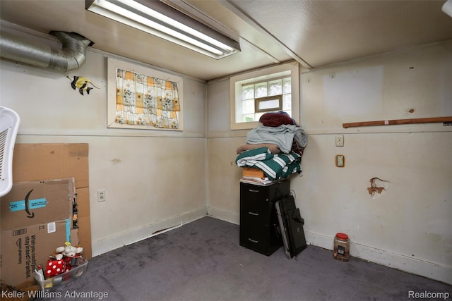 2931 4th St, Trenton, MI 48183 - basement featuring dark colored carpet and baseboards