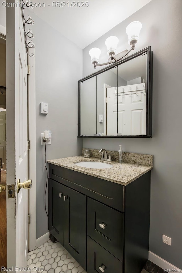 1400 W Predmore Rd, Oakland, MI 48363 - bathroom featuring vanity and a chandelier