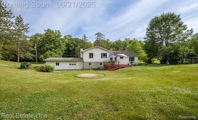1400 W Predmore Rd, Oakland, MI 48363 - back of house with a wooden deck, a lawn, and view of scattered trees