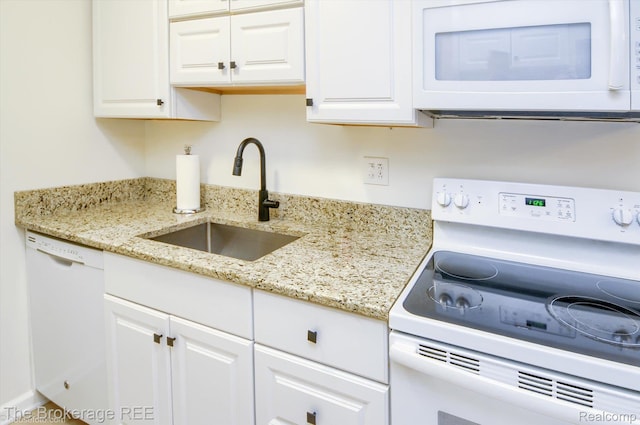 810 Plate St Unit 103, Rochester, MI 48307 - kitchen featuring white appliances, a sink, white cabinets, and light stone countertops