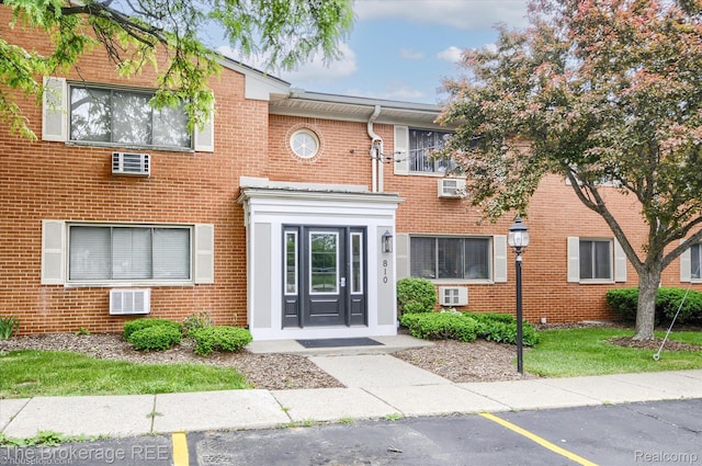 810 Plate St Unit 103, Rochester, MI 48307 - view of property with uncovered parking