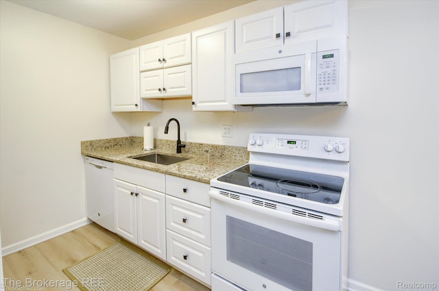 810 Plate St Unit 103, Rochester, MI 48307 - kitchen with white appliances, a sink, white cabinetry, light wood-style floors, and light stone countertops