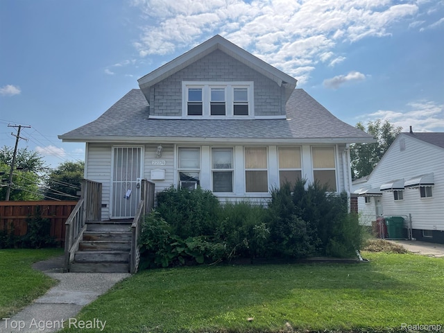 22174 Cushing Ave, Eastpointe, MI 48021 - bungalow-style home with roof with shingles