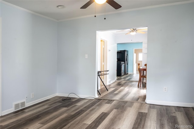 2910 Peerless Ave, Waterford, MI 48328 - empty room with ceiling fan, wood finished floors, baseboards, and crown molding