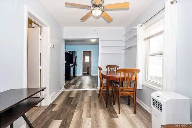 2910 Peerless Ave, Waterford, MI 48328 - dining space with wood finished floors, ceiling fan, ornamental molding, and baseboards
