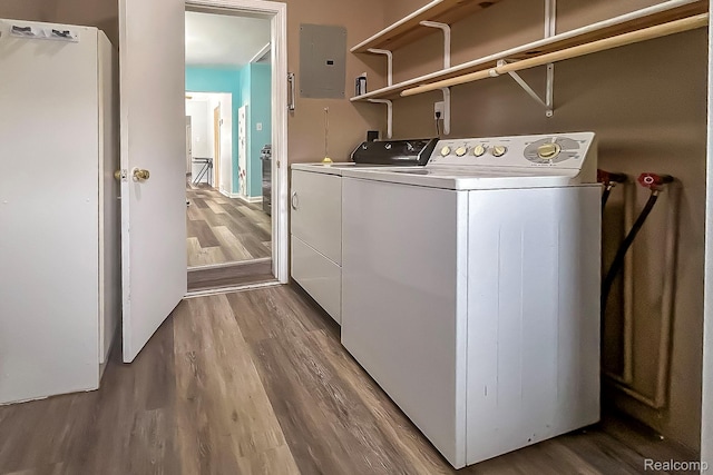 2910 Peerless Ave, Waterford, MI 48328 - washroom featuring electric panel, independent washer and dryer, and wood finished floors