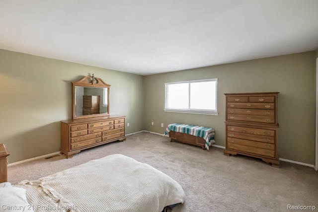 4851 Shoreline Blvd, Waterford, MI 48329 - bedroom with carpet flooring and baseboards