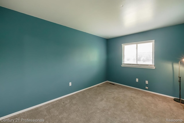 4851 Shoreline Blvd, Waterford, MI 48329 - carpeted empty room with baseboards