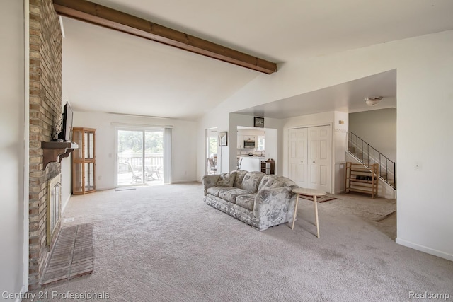 4851 Shoreline Blvd, Waterford, MI 48329 - carpeted living area with a brick fireplace, stairs, and baseboards