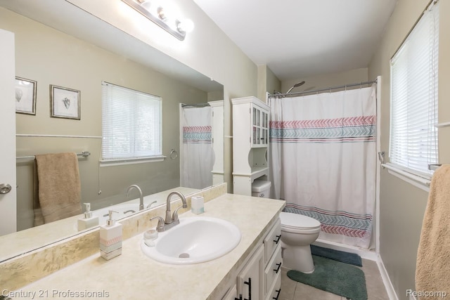 4851 Shoreline Blvd, Waterford, MI 48329 - full bathroom with vanity, toilet, baseboards, tile patterned floors, and curtained shower