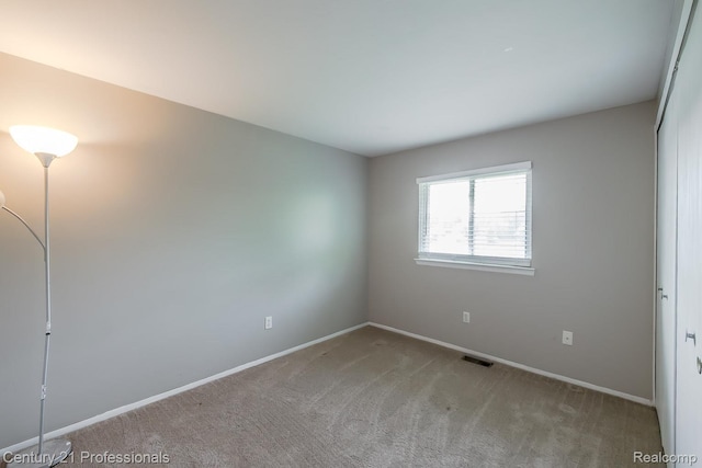 4851 Shoreline Blvd, Waterford, MI 48329 - empty room with carpet floors and baseboards