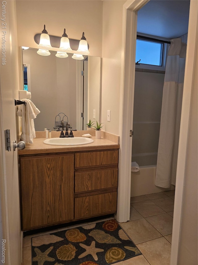 5714 N Creeks Xing, Williamsburg, MI 49690 - full bathroom featuring vanity, tile patterned flooring, and shower / tub combo
