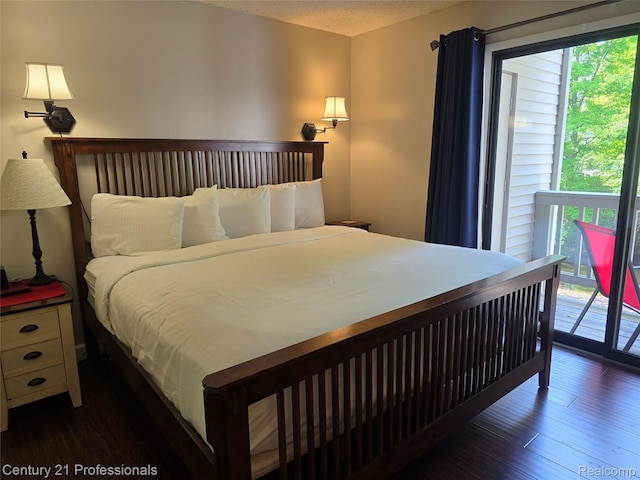 5714 N Creeks Xing, Williamsburg, MI 49690 - bedroom with access to outside and wood finished floors