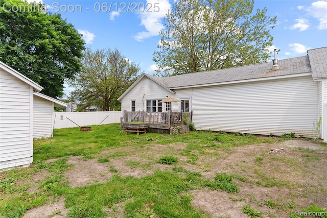 335 Main St, Morrice, MI 48857 - rear view of property featuring a wooden deck