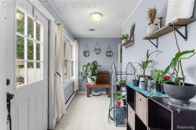 335 Main St, Morrice, MI 48857 - doorway to outside with a textured ceiling, light tile patterned floors, baseboard heating, baseboards, and ornamental molding