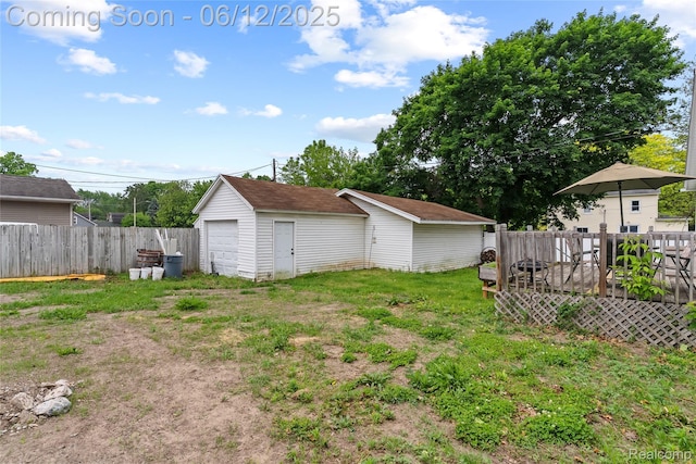 335 Main St, Morrice, MI 48857 - view of yard with a garage and an outdoor structure
