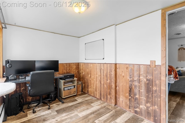 335 Main St, Morrice, MI 48857 - home office featuring wainscoting, wood walls, and wood finished floors