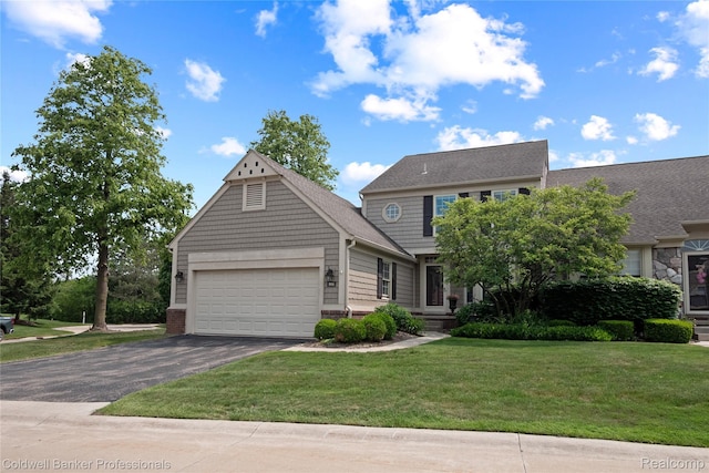 916 Tartan Trl, Bloomfield Hills, MI 48304 - view of front facade with an attached garage, asphalt driveway, a front lawn, and brick siding