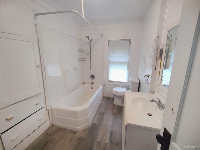 1505 Downey St, Flint, MI 48503 - full bathroom with toilet, bathing tub / shower combination, wood finished floors, and vanity