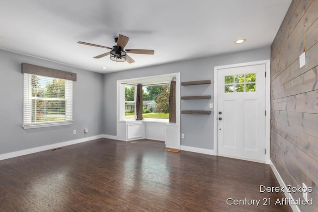 4246 Flamingo Ave SW, Wyoming, MI 49509 - foyer entrance with ceiling fan, wood finished floors, recessed lighting, baseboards, and wood walls