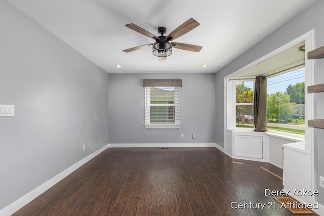 4246 Flamingo Ave SW, Wyoming, MI 49509 - empty room with healthy amount of natural light, wood finished floors, a ceiling fan, baseboards, and recessed lighting