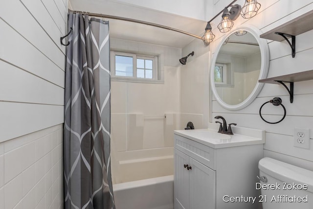 4246 Flamingo Ave SW, Wyoming, MI 49509 - full bathroom with shower / tub combo with curtain, vanity, and toilet