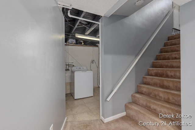 4246 Flamingo Ave SW, Wyoming, MI 49509 - staircase with washer / clothes dryer and baseboards