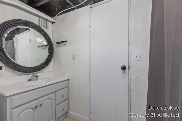 4246 Flamingo Ave SW, Wyoming, MI 49509 - bathroom with vanity and a shower with curtain