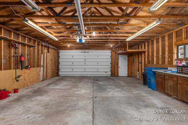 4246 Flamingo Ave SW, Wyoming, MI 49509 - garage featuring a garage door opener