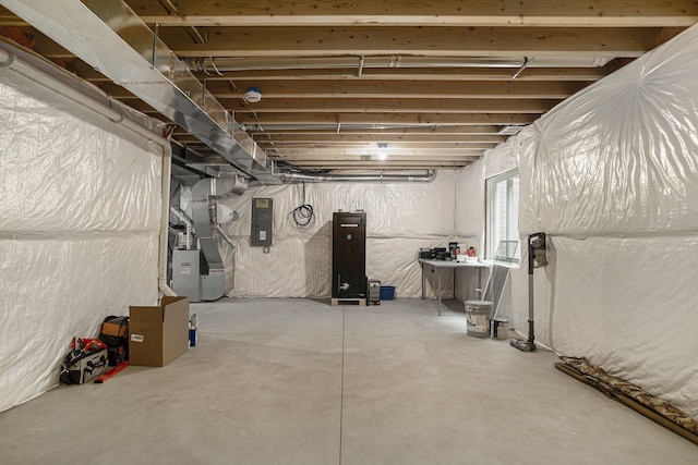 1047 Rebecca St, Marshall, MI 49068 - below grade area with electric panel and heating unit