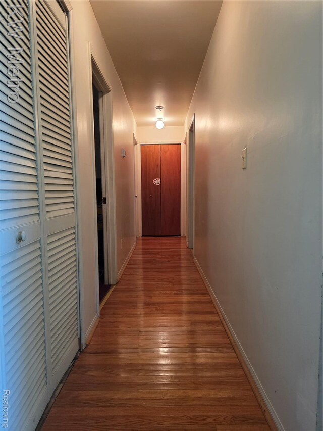 29827 Oakwood St, Inkster, MI 48141 - corridor with wood finished floors and baseboards