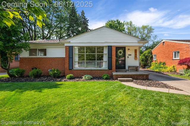 1014 Englewood Ave, Royal Oak, MI 48073 - view of front of house with brick siding and a front yard