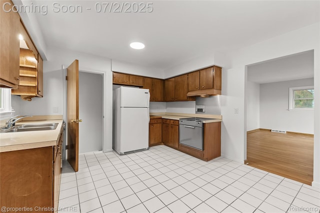 1616 Catalpa Dr, Royal Oak, MI 48067 - kitchen featuring freestanding refrigerator, light countertops, electric range oven, light tile patterned flooring, and open shelves
