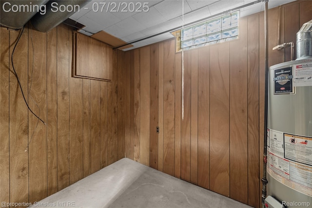 1616 Catalpa Dr, Royal Oak, MI 48067 - below grade area featuring gas water heater and wooden walls