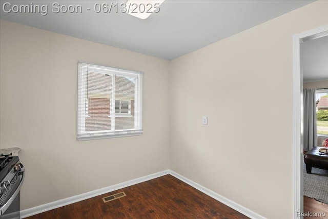 9243 Cornell St, Plymouth, MI 48180 - empty room featuring baseboards and dark wood-style flooring