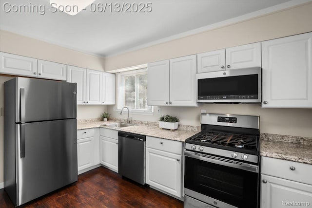 9243 Cornell St, Plymouth, MI 48180 - kitchen with appliances with stainless steel finishes and white cabinets