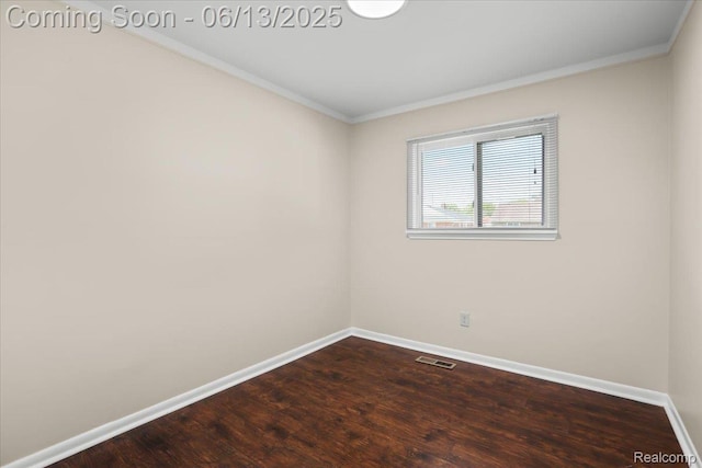 9243 Cornell St, Plymouth, MI 48180 - spare room with ornamental molding and dark wood finished floors