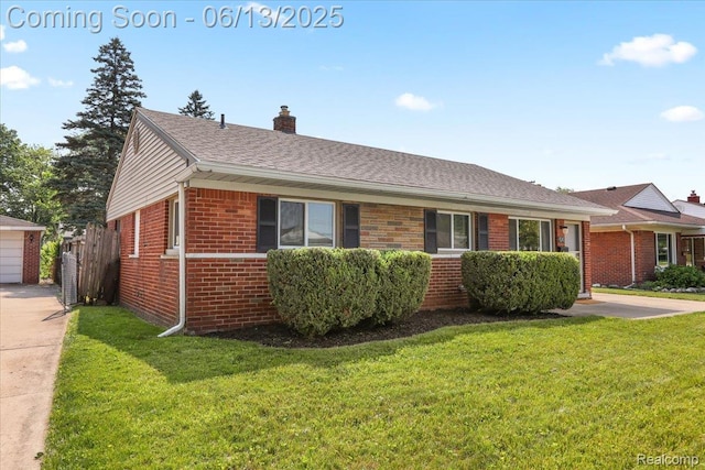 9243 Cornell St, Plymouth, MI 48180 - view of front of home with brick siding, a front lawn, and a chimney