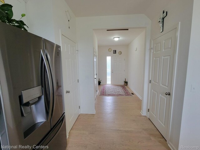 51485 Maple Leaf Dr, Macomb, MI 48042 - corridor featuring light wood-style flooring and baseboards