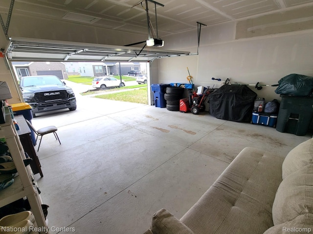 51485 Maple Leaf Dr, Macomb, MI 48042 - garage with a garage door opener