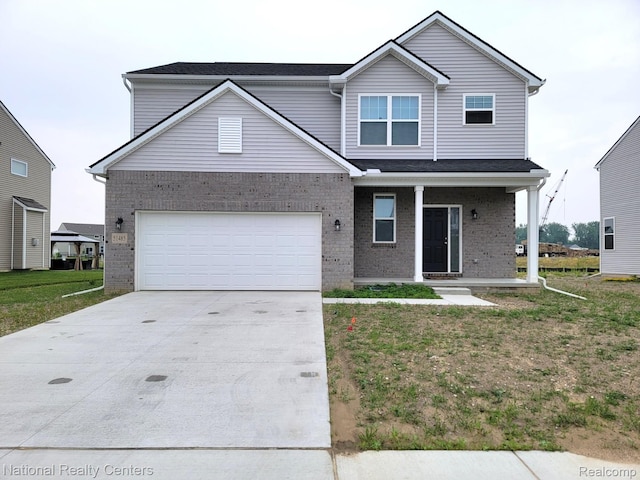 51485 Maple Leaf Dr, Macomb, MI 48042 - traditional home with driveway, a porch, brick siding, and a front lawn