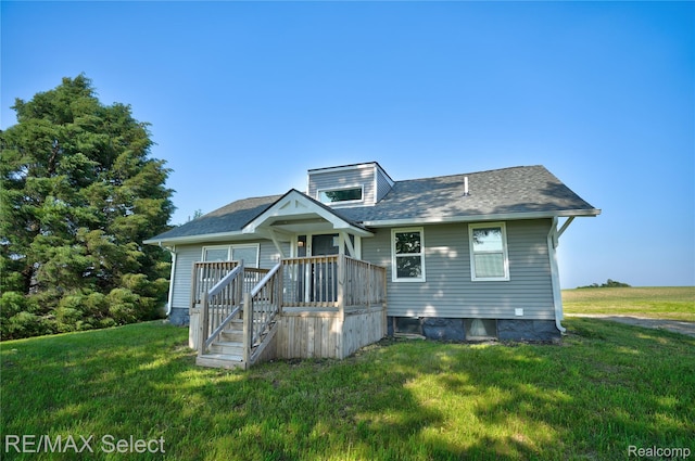 4470 N Lake Rd, Columbiaville, MI 48421 - view of front of house with a front yard and roof with shingles